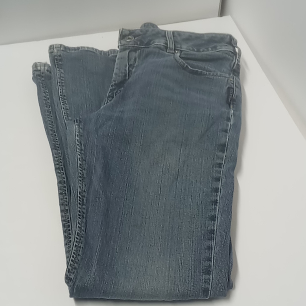 Women's buckle silver jeans size 31